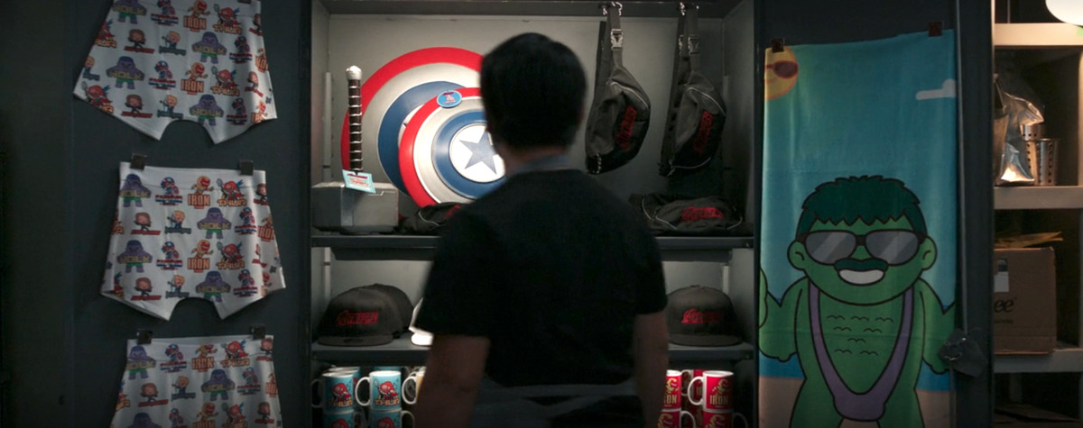 a closet full of bootleg avengers merchandise, including a towel featuring hulk wearing a purple mankini and avongers boxers