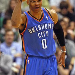 Oklahoma City Thunder point guard Russell Westbrook (0) after shooting a 3-point shot as the Utah Jazz are defeated by the Oklahoma City Thunder 90-80 as they play NBA basketball Tuesday, April 9, 2013, in Salt Lake City.