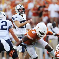 BYU kicker Trevor Samson watches one of his extra points as BYU and Texas play Saturday, Sept. 6, 2014, in Austin Texas.