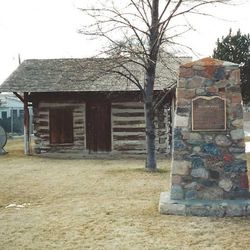 This log cabin was the birthplace of Harles R. Stevens, the first white person born in Morgan County, Sept. 23, 1857. Harles Stevens was an ancestor of Shawn Stevens.