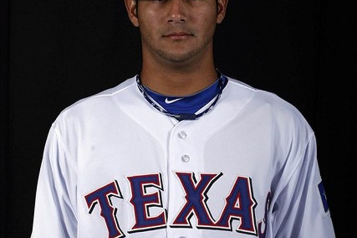 Feb 28, 2012; Surprise, AZ, USA;  Texas Rangers starting pitcher Martin Perez (33) poses for a picture during the Rangers photo day at Surprise Stadium.  Mandatory Credit: Rick Scuteri-US PRESSWIRE