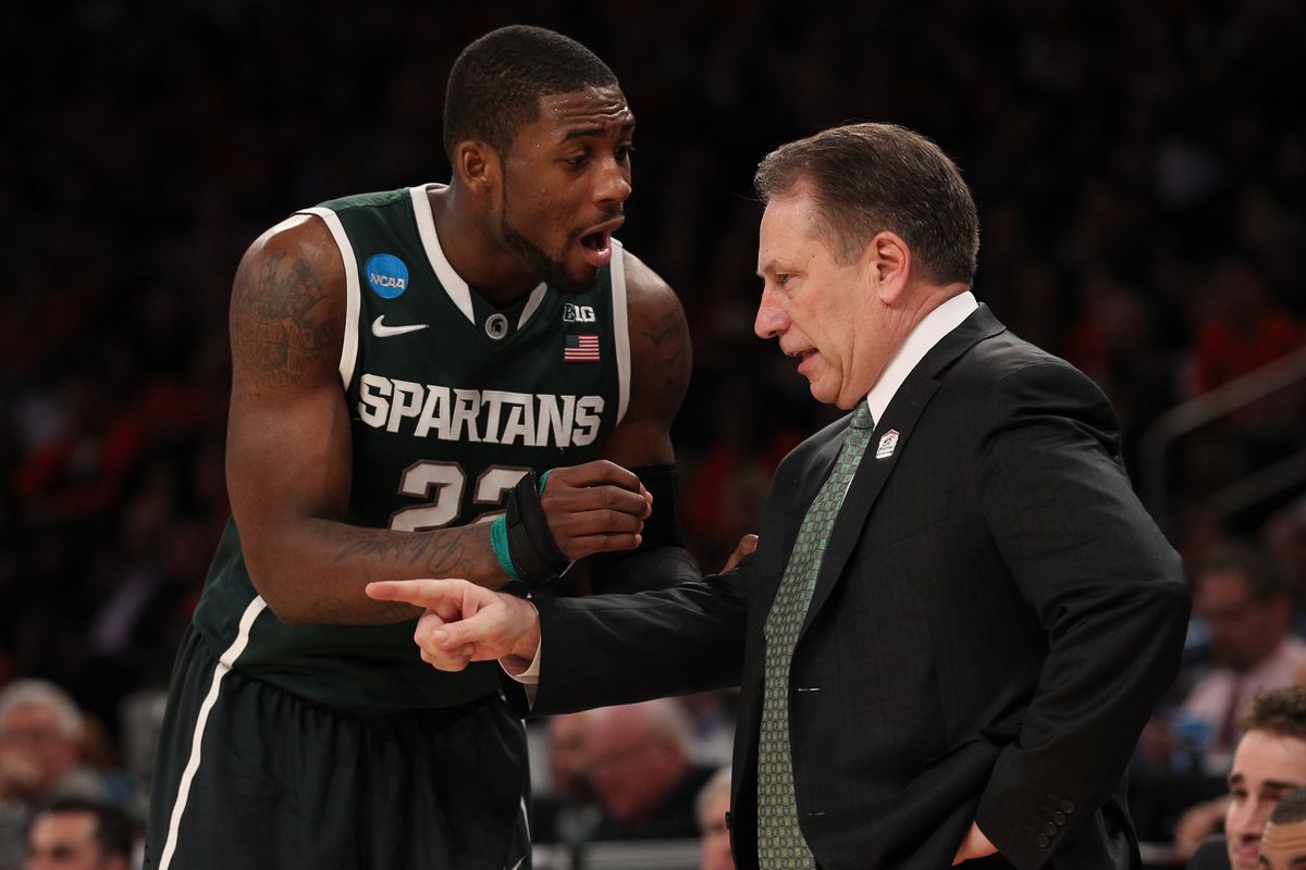 Branden Dawson seen here with Coach Izzo and a healthy hand