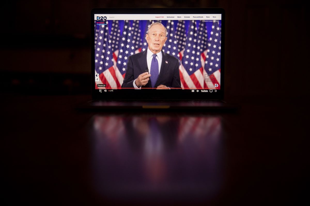 Mike Bloomberg speaking on a screen.