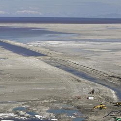 Miles westward over the Great Salt Lake, a path leading to water pumps in the event of flooding can be seen still not near capacity on Tuesday, April 19, 2011.  Mike Terry, Deseret News