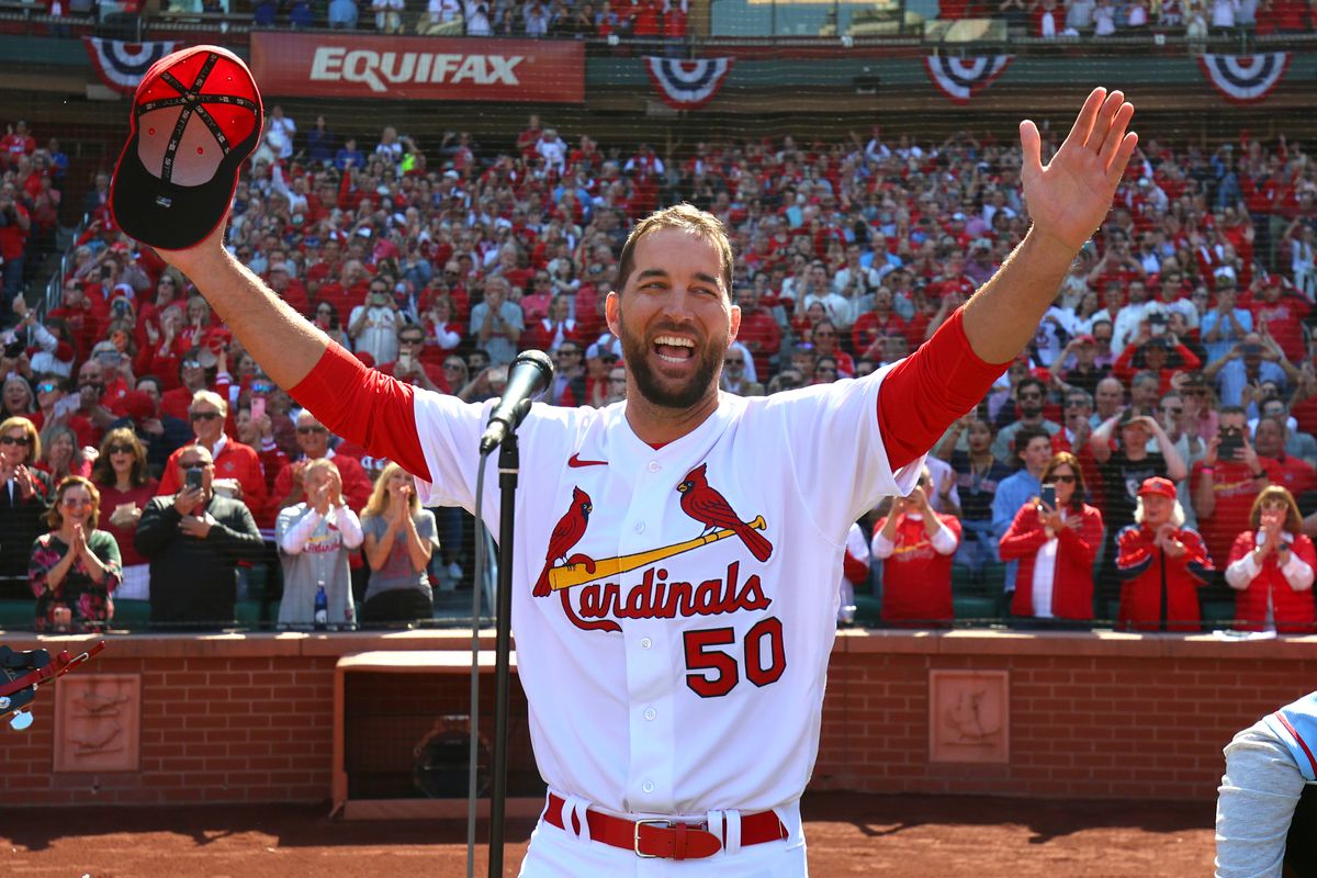 Adam Wainwright of the St. Louis Cardinals sings the national anthem prior to the game between the Toronto Blue Jays and the St. Louis Cardinals at Busch Stadium on Thursday, March 30, 2023 in St. Louis, Missouri.