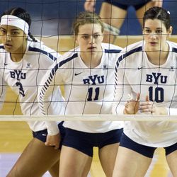 BYU middle hitter Amy Boswell (10), outside hitter Lacy Haddock (11) and setter Alohi Robins-Hardy (3) await a serve during an NCAA volleyball playoff game against UNLV in Provo on Saturday, Dec. 3, 2016. BYU swept UNLV 3-0 to advance to the Sweet 16.