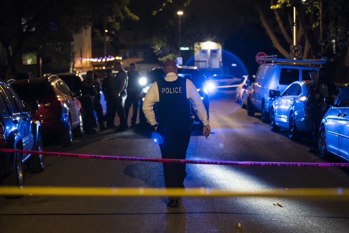 Chicago police investigate Saturday night in the 3700 block of West McLean Avenue in Logan Square, where authorities said a 29-year-old man was shot multiple times.