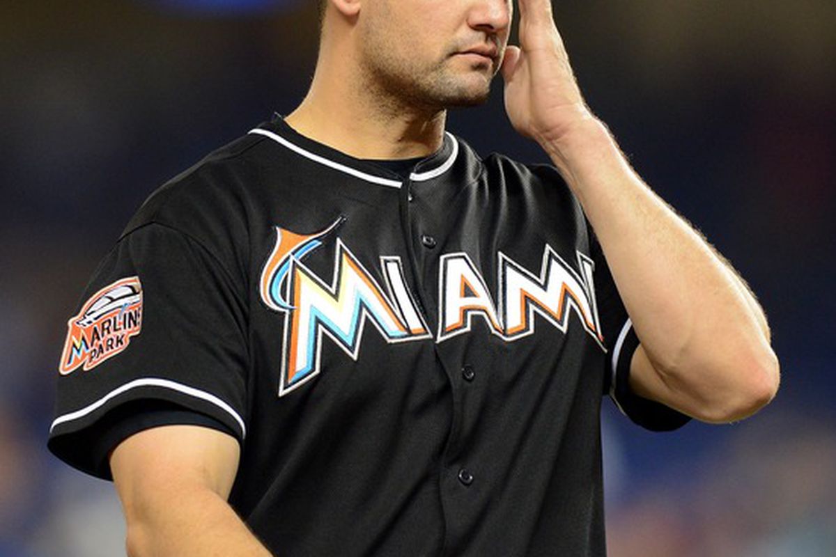 June 29, 2012; Miami, FL, USA; Miami Marlins first baseman Gaby Sanchez (15) reacts during the fifth inning against the Philadelphia Phillies at Marlins Park. Mandatory Credit: Steve Mitchell-US PRESSWIRE