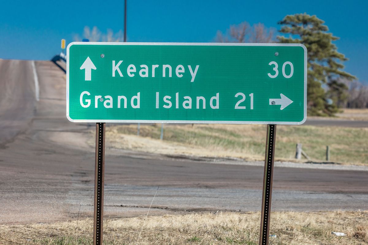 Sign pointing to Kearney and Grand Island Nebraska - Midwestern America, along Interstate Highway 80