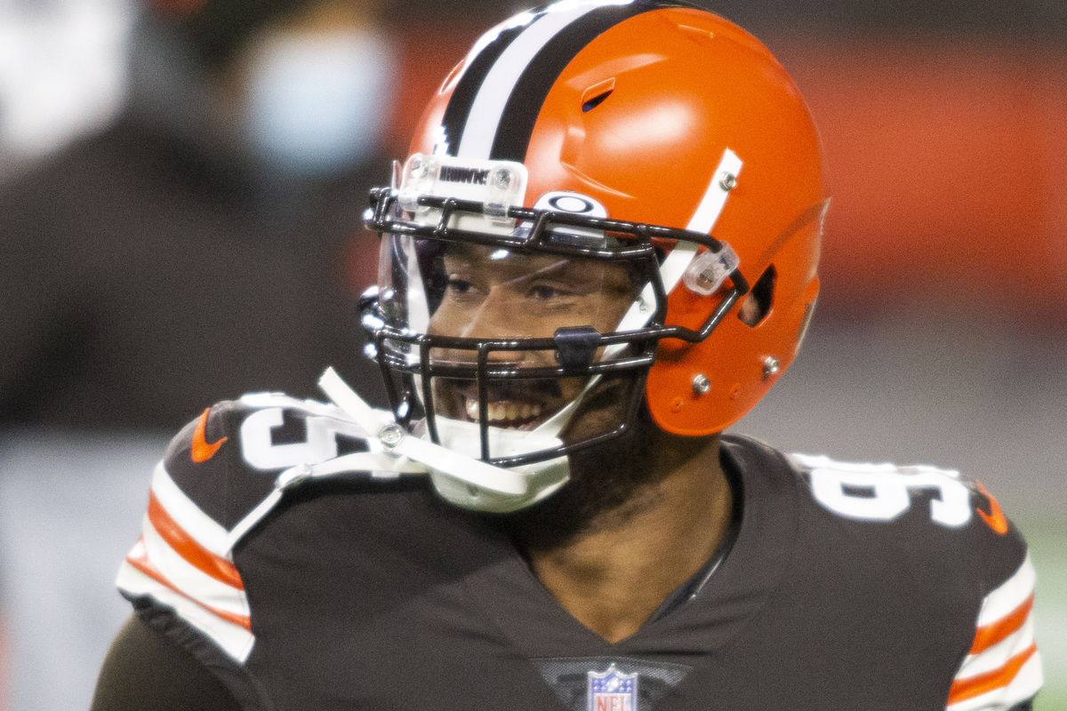 Cleveland Browns defensive end Myles Garrett (95) laughs during warmups before the game against the Baltimore Ravens at FirstEnergy Stadium.