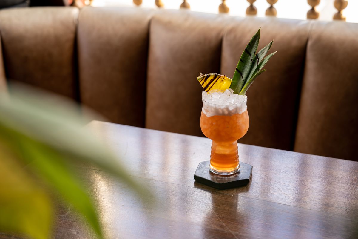 The Charliebird at Dirty Pretty arrives garnished with pineapple and aloe leaves.