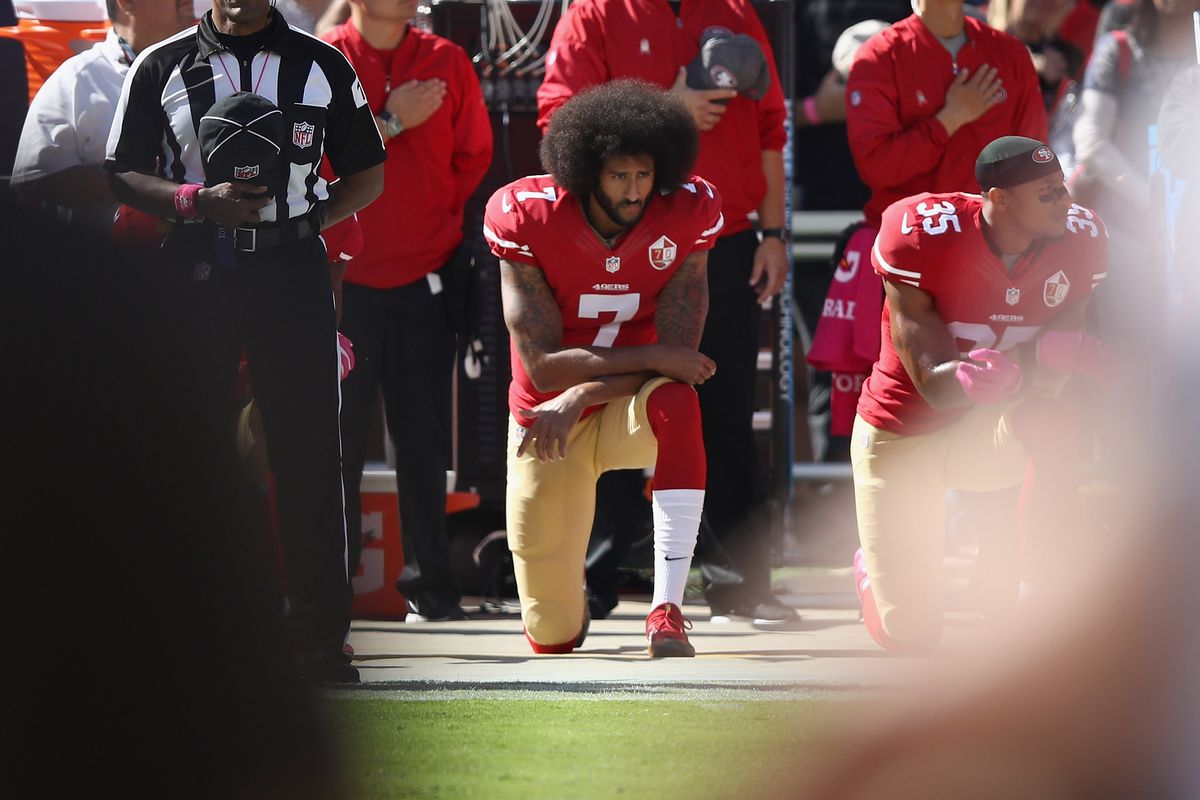 Colin Kaepernick kneels during the national anthem before a 49ers-Buccaneers game in 2016.