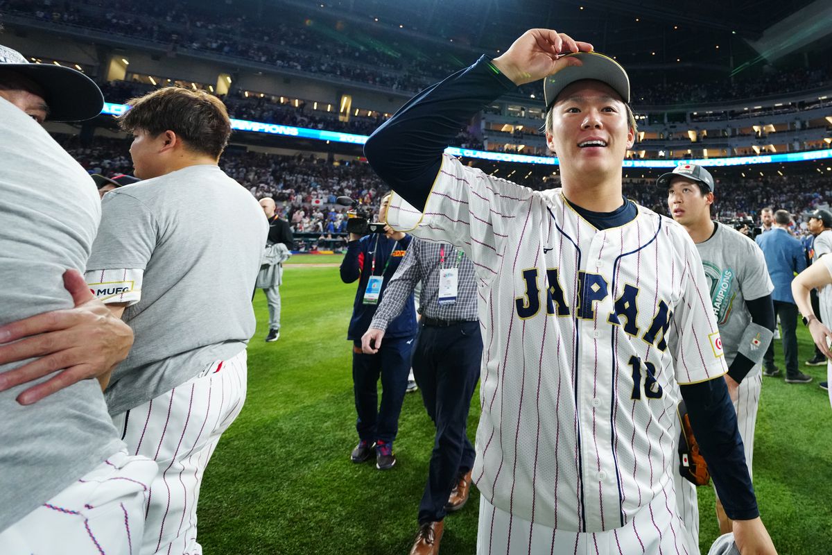 Shohei Ohtani of Team Japan celebrates with teammates after a 3-2 victory over Team USA in the 2023 World Baseball Classic Championship game at loanDepot Park on Tuesday, March 21, 2023 in Miami, Florida.