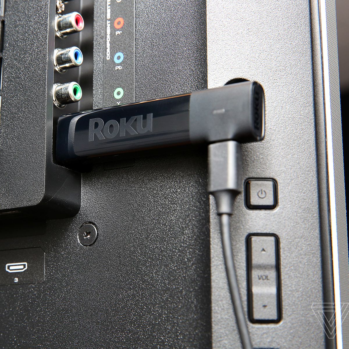 An image of the Roku Streaming Stick Plus, the best streaming device for ease of use, plugged into a TV.