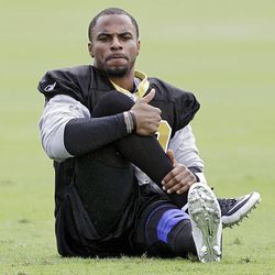 New Orleans Saints safety Darren Sharper stretches during football practice on Friday.