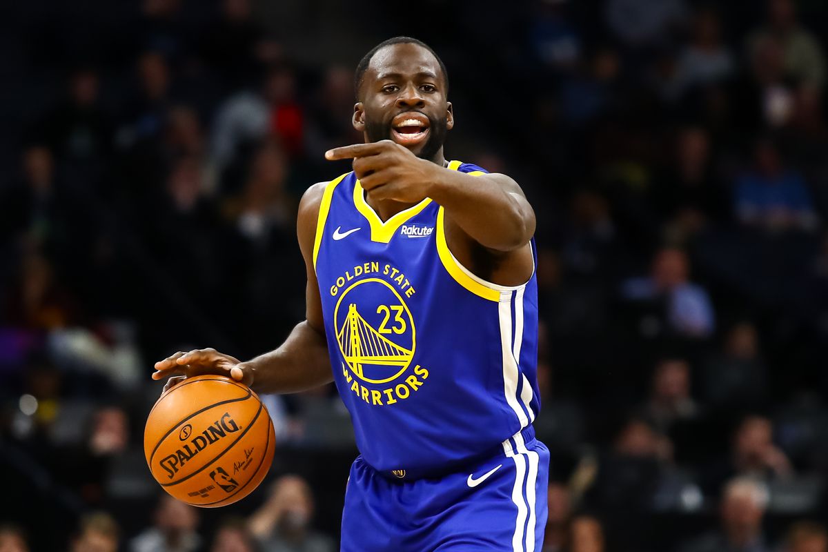 Golden State Warriors forward Draymond Green directs traffic in the first quarter against the Minnesota Timberwolves at Target Center.