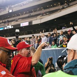 Kansas City Chiefs head coach Andy Reid waves to fans as he leaves the field after defeating the Philadelphia Eagles at Lincoln Financial Field. 