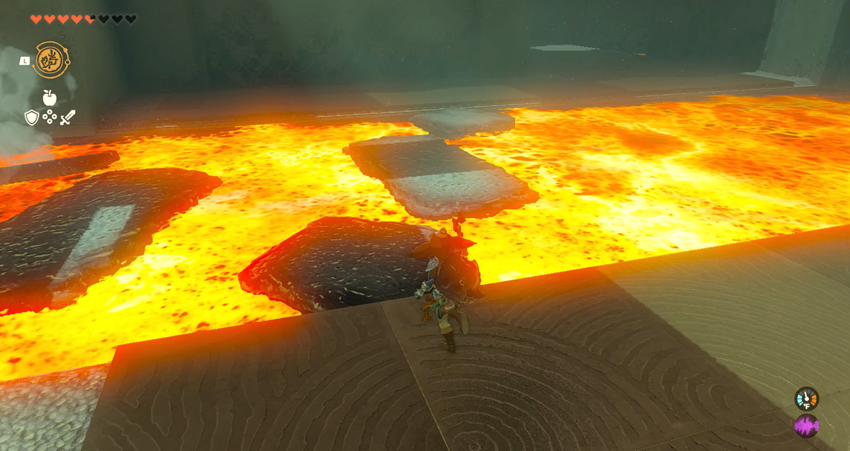 Link complemplating using a makeshift rock bridge to cross a fire river in The Legend of Zelda: Tears of the Kingdom’s Timawak Shrine