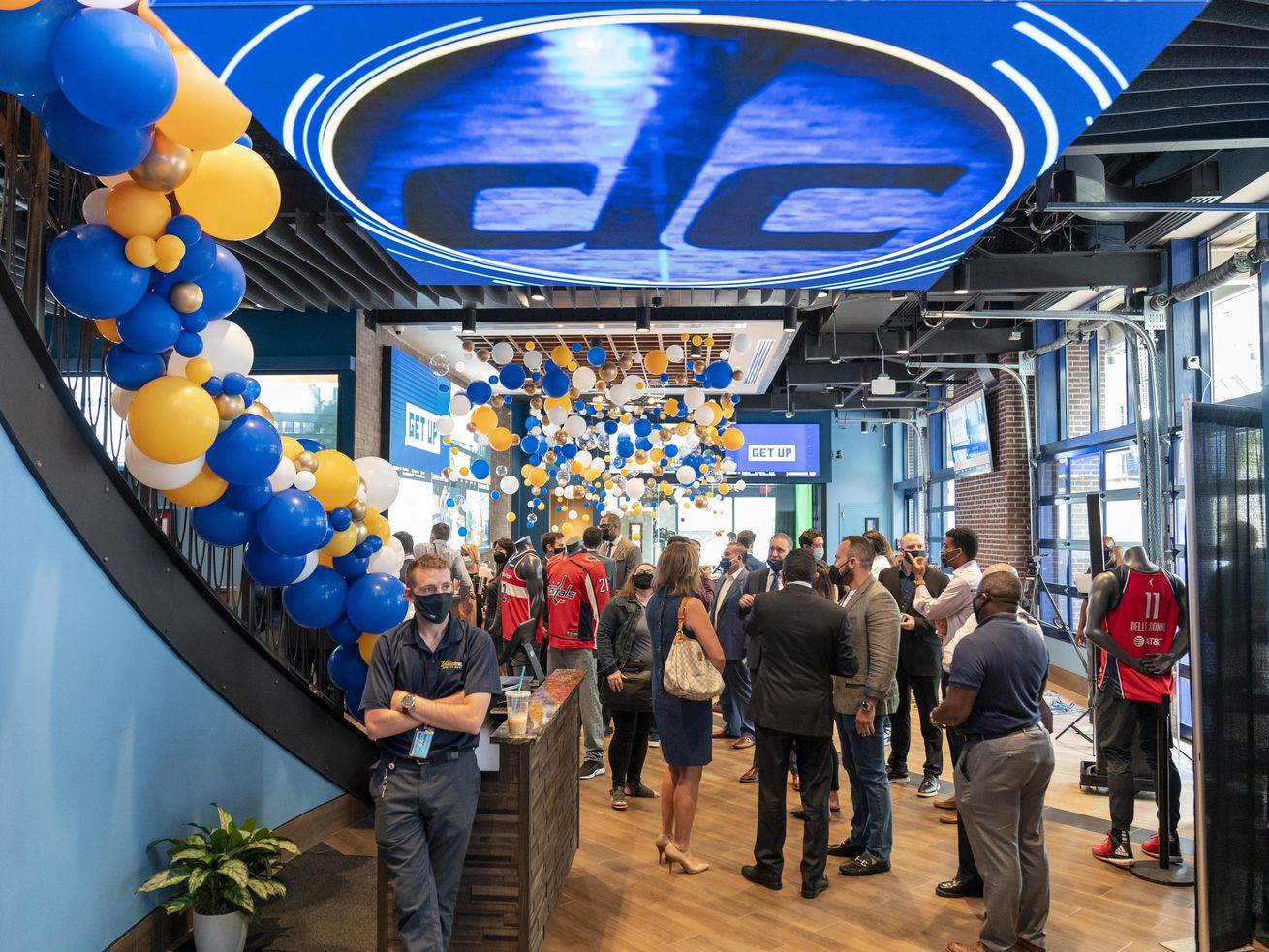Guests mingle at a ribbon cutting ceremony at the William Hill Sportsbook at Capital One Arena in Washington, D.C. 