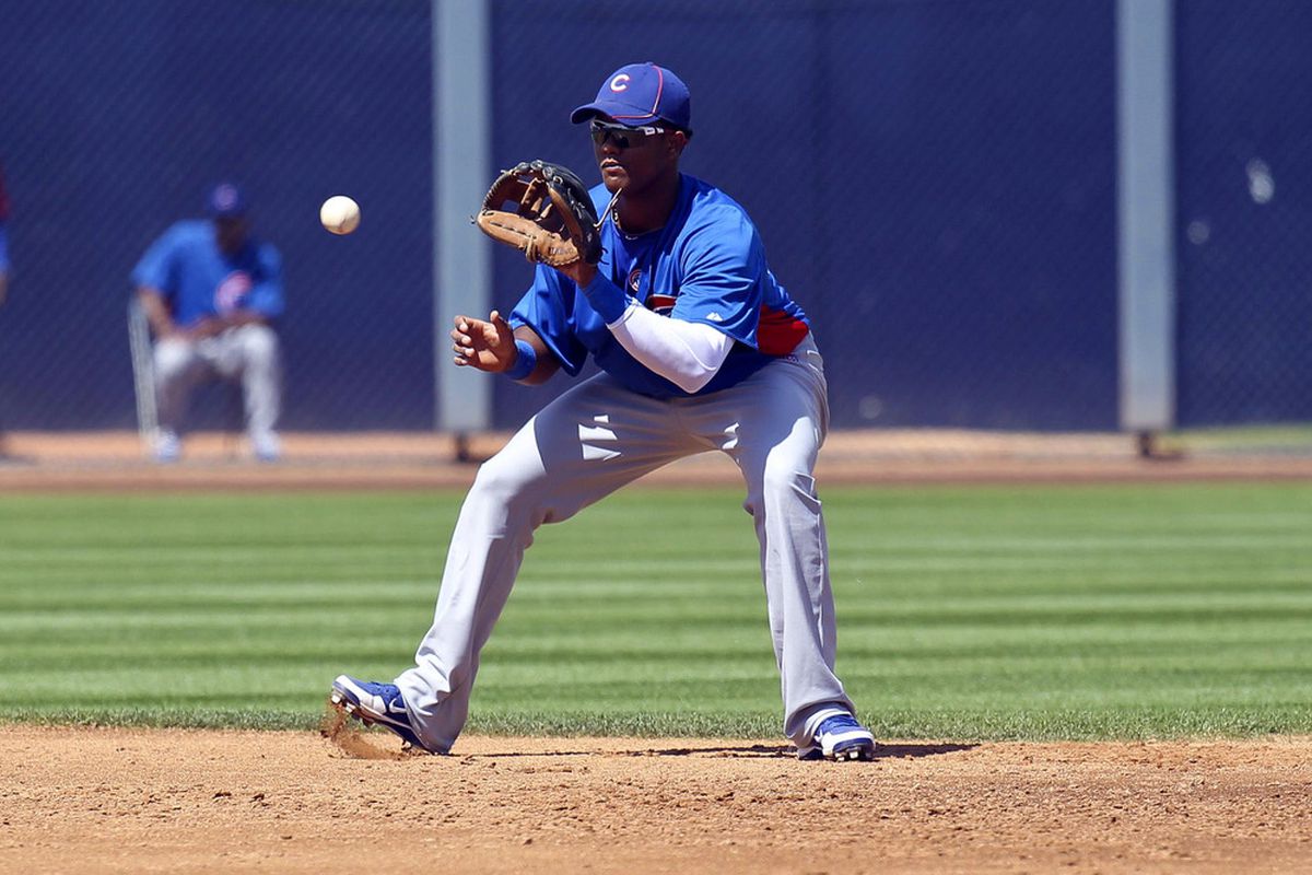 Peoria, AZ, USA; Chicago Cubs shortstop Starlin Castro fields a ground ball against the San Diego Padres at the Peoria Sports Complex. Credit: James Guillory-US PRESSWIRE