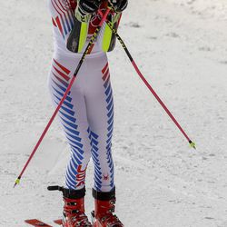 Mikaela Shiffrin, of the United States, holds her head in her hands after winning the gold medal in the Women's Giant Slalom at the 2018 Winter Olympics in Pyeongchang, South Korea, Thursday, Feb. 15, 2018. (AP Photo/Morry Gash)