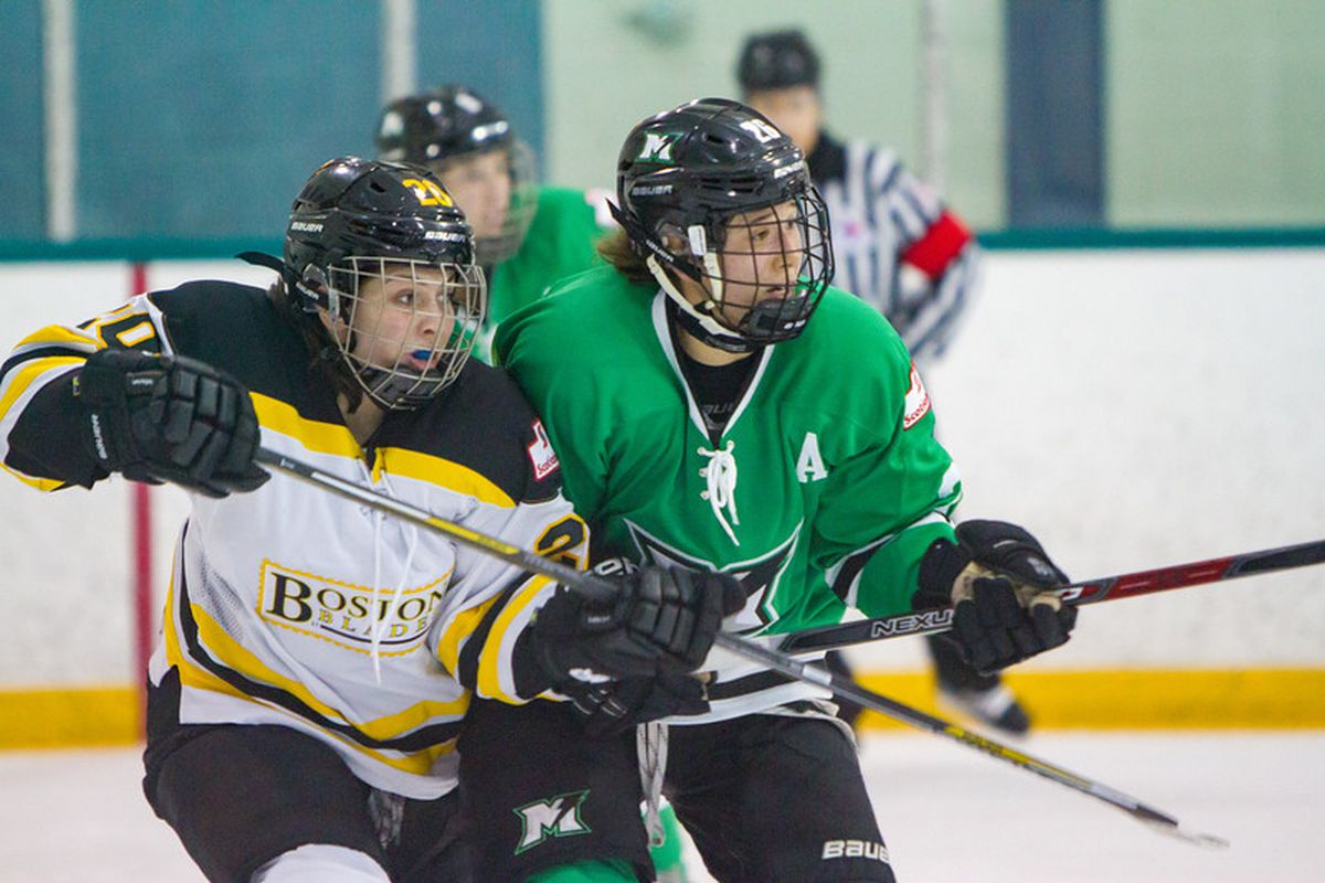 Markham Thunder’s Jamie Lee Rattray jostles with Boston Blades Meaghan Spurling during a Markham home game in the 2017-18 season