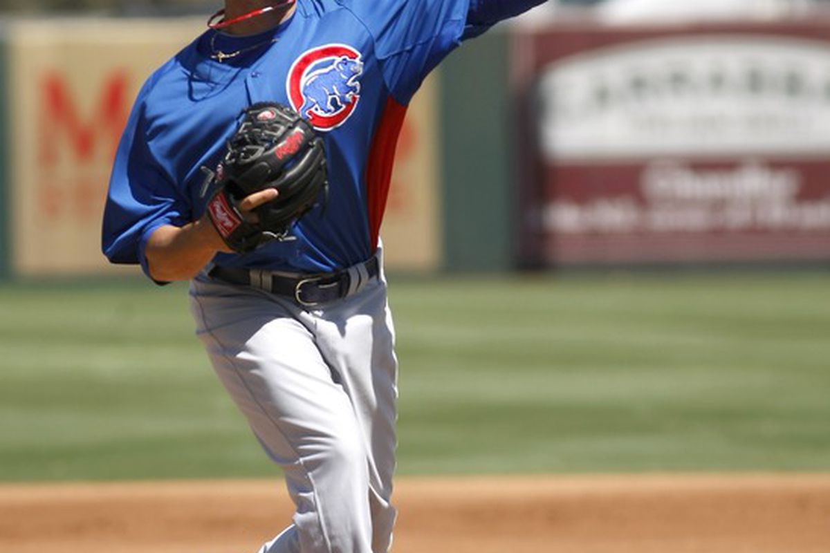 April 1, 2012; Scottsdale, AZ, USA; Chicago Cubs pitcher Chris Rusin (88) throws against the Los Angeles Angels in the first inning at Tempe Diablo Stadium.  Mandatory Credit: Rick Scuteri-US PRESSWIRE