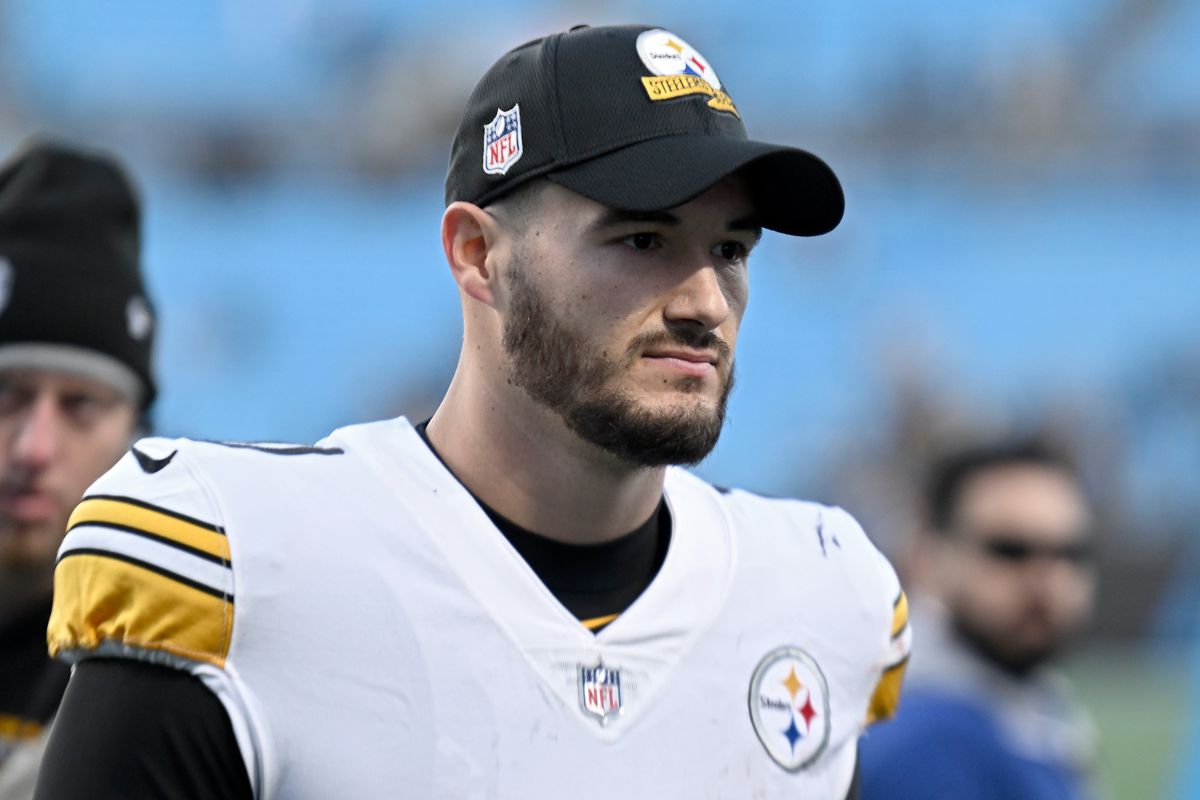 Mitch Trubisky #10 of the Pittsburgh Steelers walks off the field after defeating the Carolina Panthers at Bank of America Stadium on December 18, 2022 in Charlotte, North Carolina.