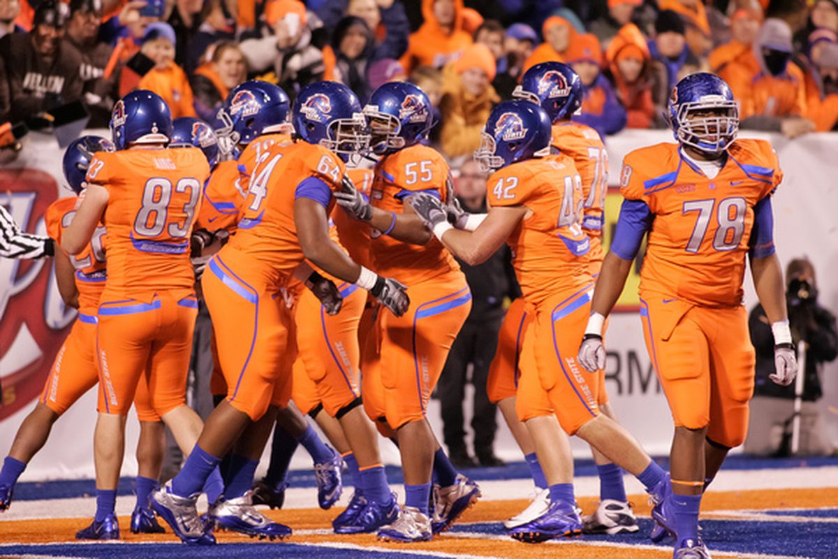 BOISE ID - NOVEMBER 19:  The Boise State Broncos celebrate after a touchdown against the Fresno State Bulldogs at Bronco Stadium on November 19 2010 in Boise Idaho.  (Photo by Otto Kitsinger III/Getty Images)