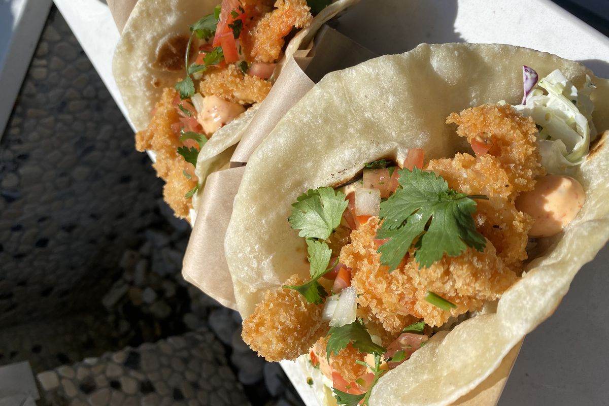 “Corpus Christi” tacos from Mijitas come with fried shrimp, spicy cilantro lime slaw, and Calabrian chile aioli.