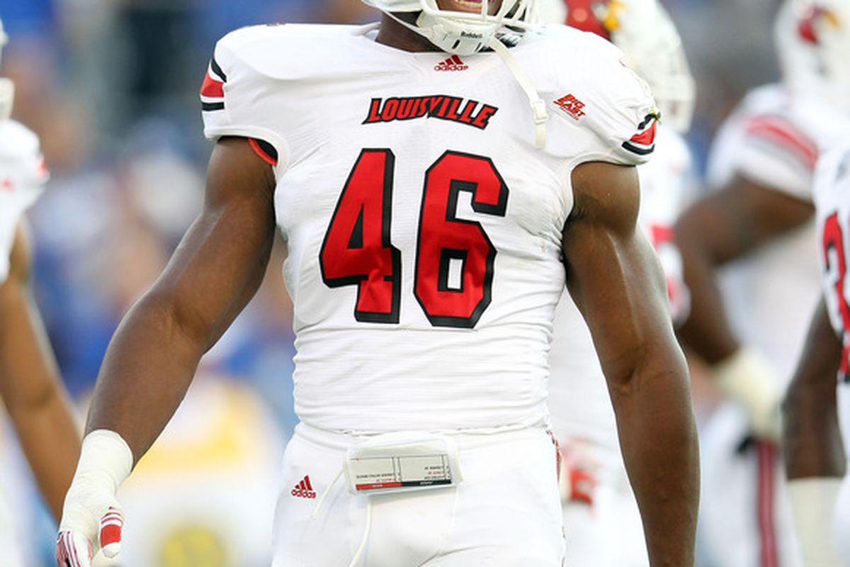 LEXINGTON, KY - SEPTEMBER 17:  Dexter Heyman#46 of the Louisville Cardinals celebrates during the game against the Kentucky Wildcats at Commonwealth Stadium on September 17, 2011 in Lexington, Kentucky.  (Photo by Andy Lyons/Getty Images)