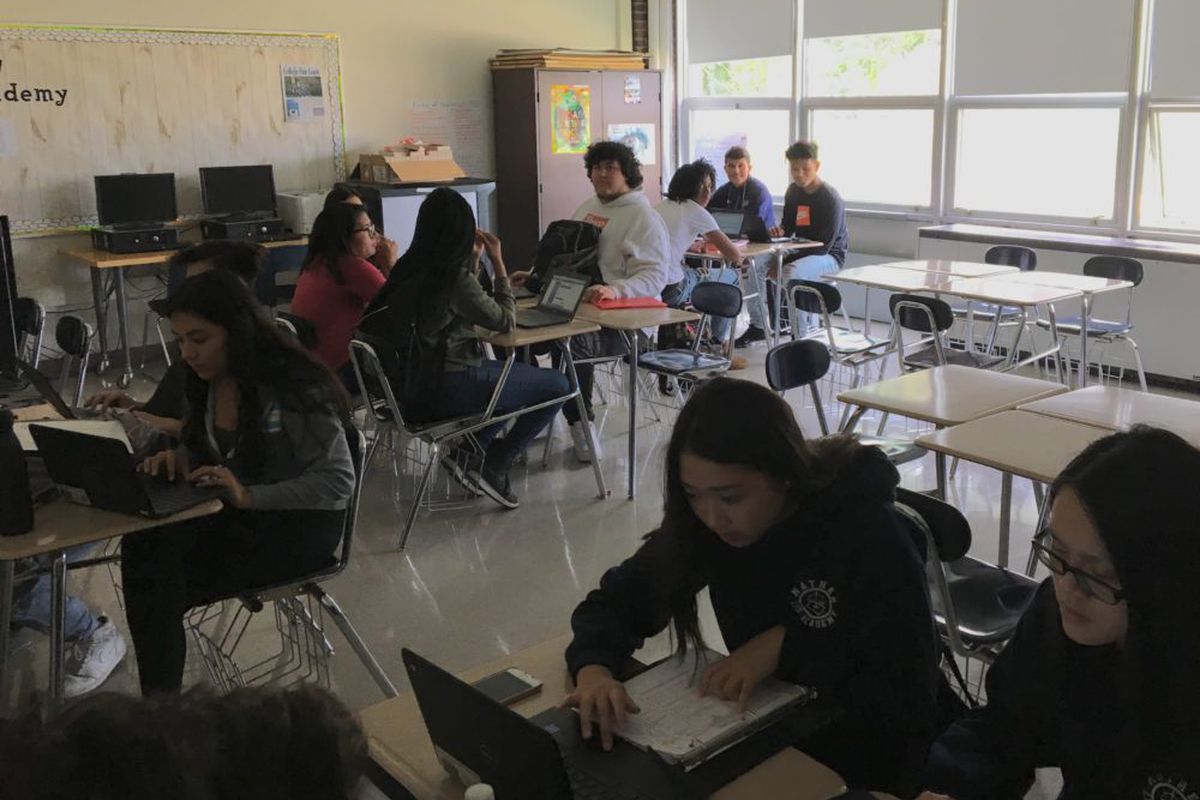 Students in a pre-law class at Chicago's Mather High fill out college applications on Sept. 19, 2018. The class is one of the school's career technical education offerings that it hopes will attract more students to enroll in the school.
