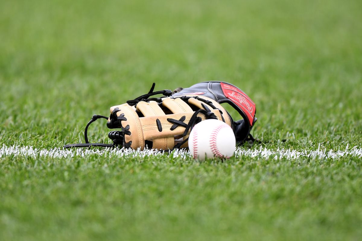 baseball glove on field 