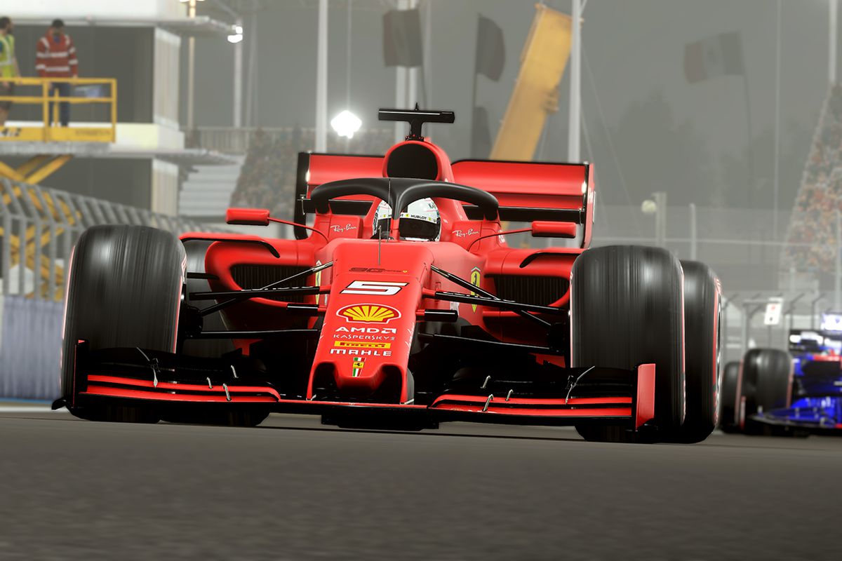 Formula 1 cars approaching the viewer at pavement level in F1 2019 at Abu Dhabi’s Yas Marina circuit