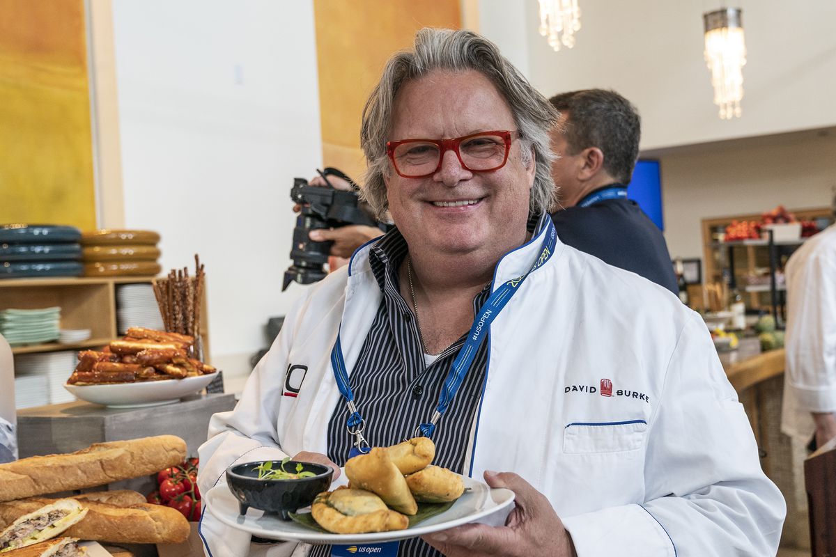 Celebrity chef David Burke holds a dish at the 2022 U.S. Open.