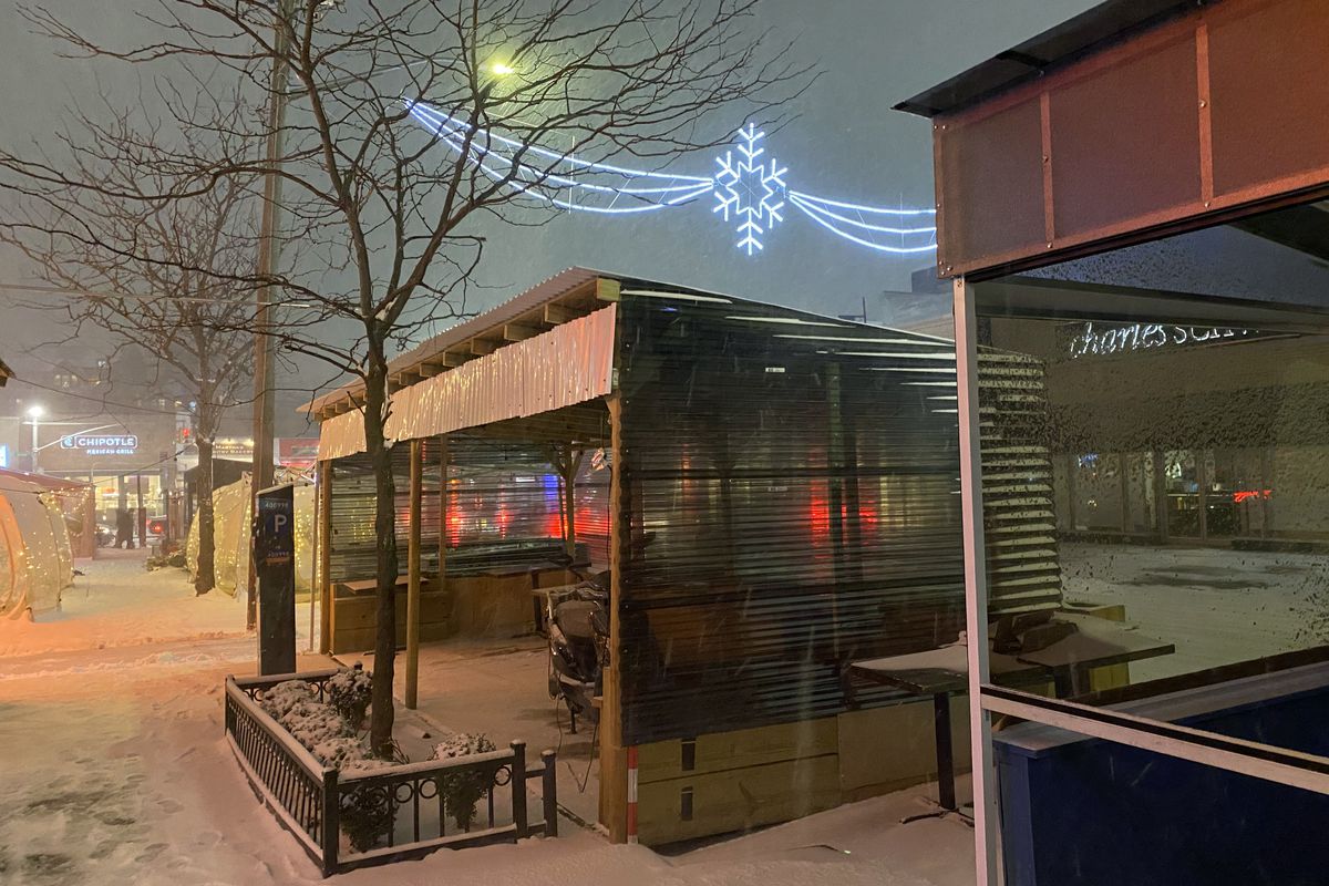 Restaurant outdoor dining shelters during snowstorm, Forest Hills, Queens, NY