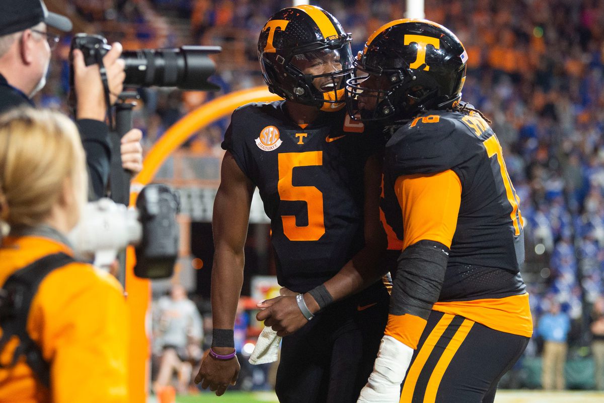 Tennessee quarterback Hendon Hooker offensive lineman Javontez Spraggins celebrate Hooker’s touchdown during the NCAA college football game against Kentucky on Saturday, October 29, 2022 in Knoxville, Tenn.