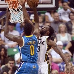 Utah's DeMarre Carroll defends New Orleans' Al-Farouq as the Utah Jazz and the New Orleans Hornets play Friday, April 5, 2013 at EnergySolutions Arena in Salt Lake City. Utah won 95-83.