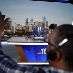 Vai Sikahema sits in front of a live picture of Philadelphia while doing his segment working as a midday anchor for NBC's channel 10 news Wednesday, May 22, 2019. Sikahema, who was born in Tonga, played on Brigham Young University's national champion winning football team in 1984 and went on to spend a decade in the NFL. Shortly after his NFL career ended he was picked up to cover sports and has now been with the station for 25 years. Sikahema was recently named one of the new Area Seventies during 189th Annual General Conference of The Church of Jesus Christ of Latter-day Saints.