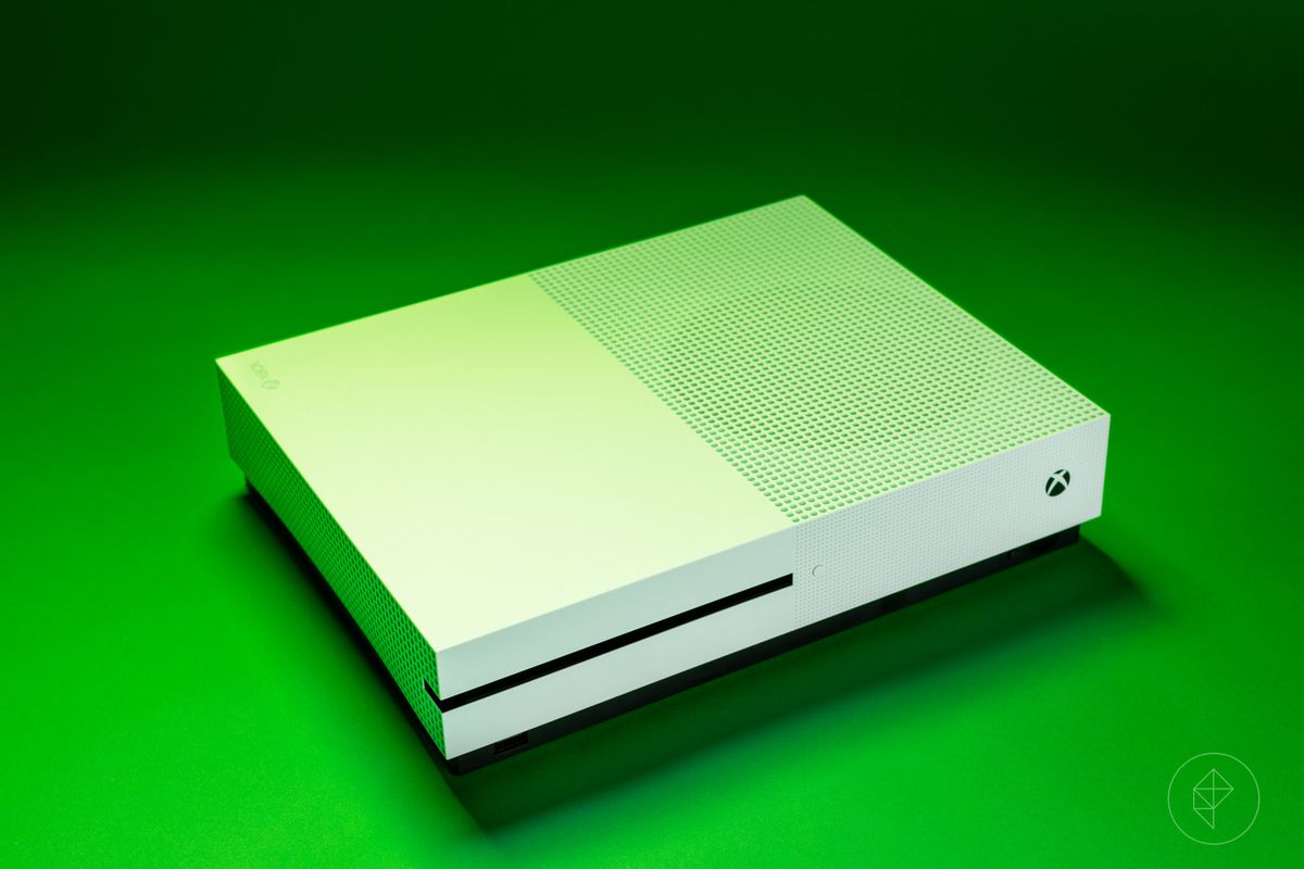 White Microsoft X-Box on a green background