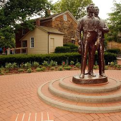 A statue of brothers Joseph and Hyrum Smith outside of Carthage Jail in Carthage, Illinois, shown her on June 26, 2002.