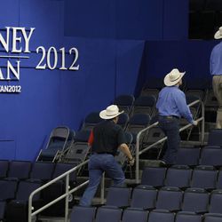 Delegates from Texas make their way through the convention seating before the start of the Republican National Convention in Tampa, Fla., on Monday, Aug. 27, 2012. (AP Photo/Charlie Neibergall) 