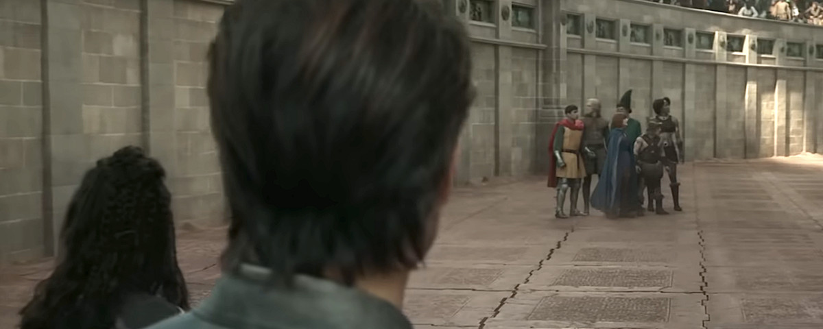 A screencap from a clip of Dungeons &amp; Dragons: Honor Among Thieves, with Chris Pine as Elgin the Bard looking across the field of a gladiatorial arena and seeing the live-action versions of the kid protagonists of the 1983-1985 Saturday morning cartoon Dungeons &amp; Dragons all huddled together