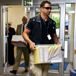 Dan Love, Bureau of Land Management special agent, and Richard Mckelvie, assistant U.S. attorney, carry files into the courthouse in Moab on Thursday, June 11, 2009. Love led Operation Cerberus, a raid involving the nation's largest Native American artifacts trafficking case, resulting in 25 arrests. Sen. Mike Lee is preparing legislation that would abolish or limit the powers of the law enforcement arm of the BLM.