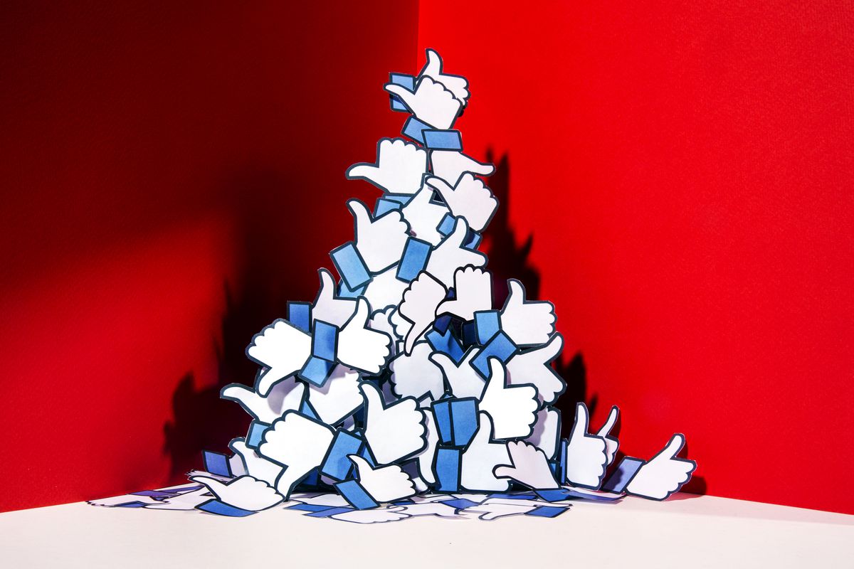 A drawing of a pile of the Facebook thumbs-up icons.