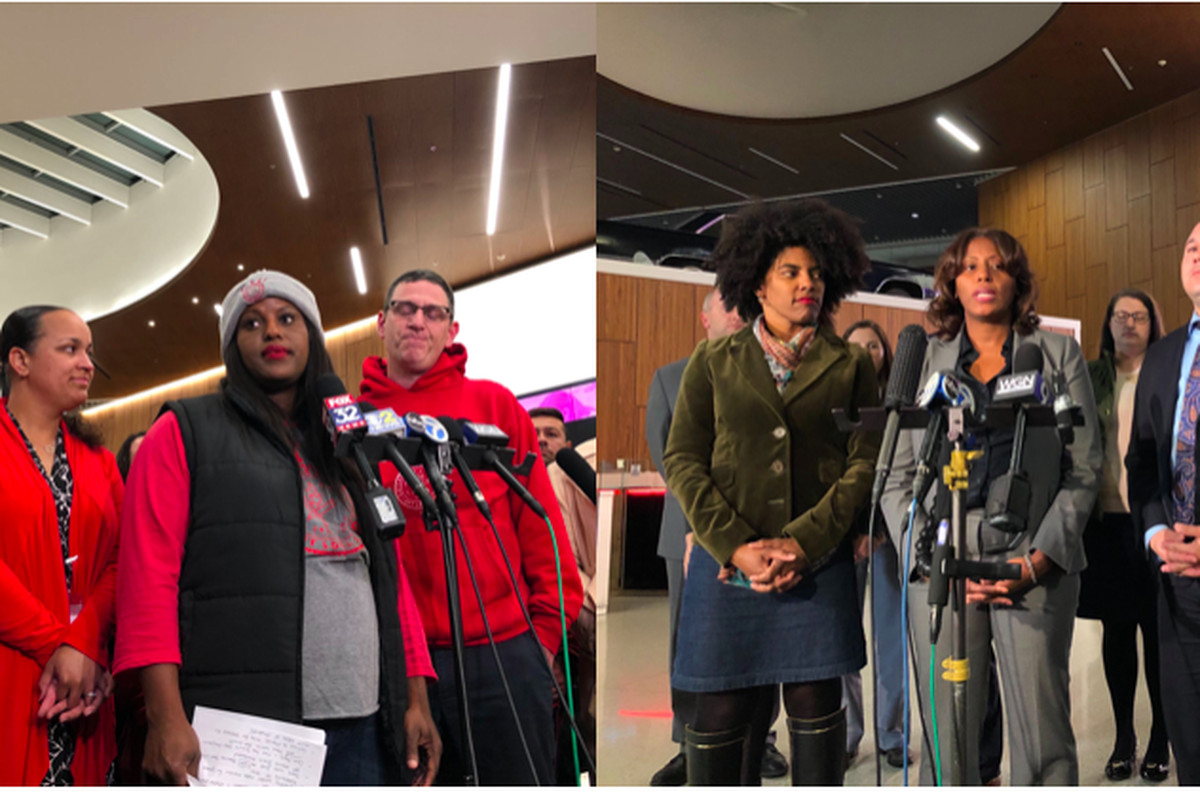 Chicago Teachers Union officials stand with Chicago Public Schools leaders in 2019.