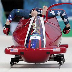 The United States' USA-1, piloted by Shauna Rohbock, with brakeman Michelle Rzepka, start during the women's two-man bobsled competition final Wednesday at the 2010 Winter Olympics in Vancouver. Rohbock's sled came in sixth.