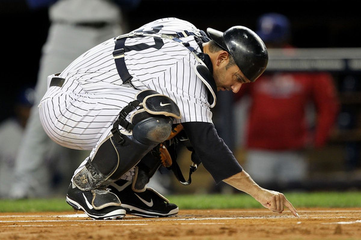 Jorge Posada with the catcher's gear on is a sight New York Yankees fans may not see often in 2011. Posada is expected to be the team's primary designated hitter this season.