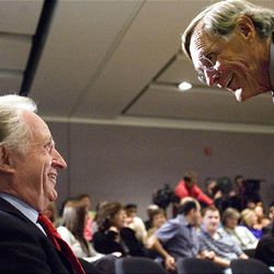 Dr. Mario Capecchi, left, is congratulated on Monday by Dr. Ray Gesteland, vice president of research at the U.'s Eccles Institute, for his Nobel Prize.