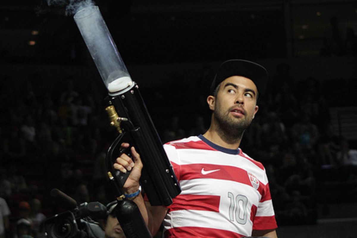 Eric Koston rocks a USMNT jersey and a t-shirt cannon during the Nike Street League 2013 event in Portland last week.